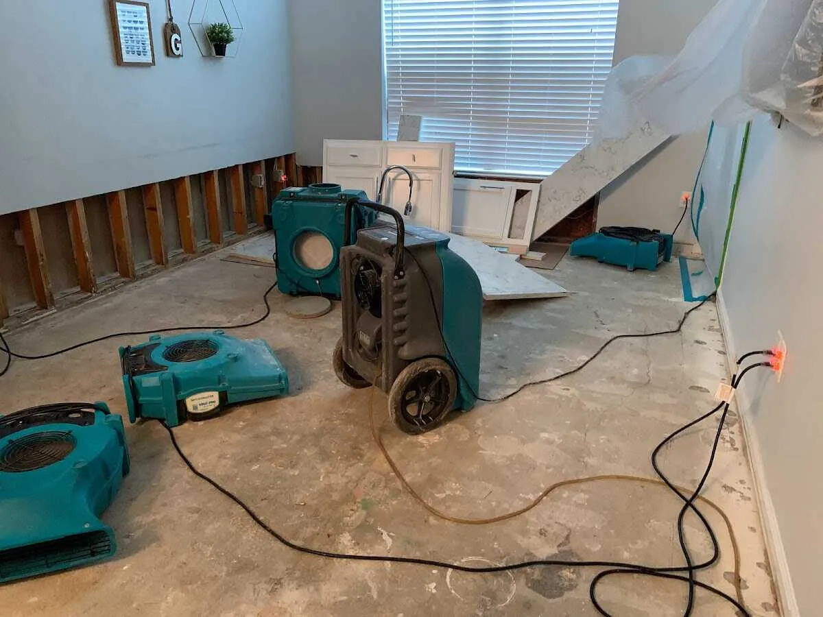 Dehumidifier in flood-cut room for Water Damage Restoration in Randolph Town
